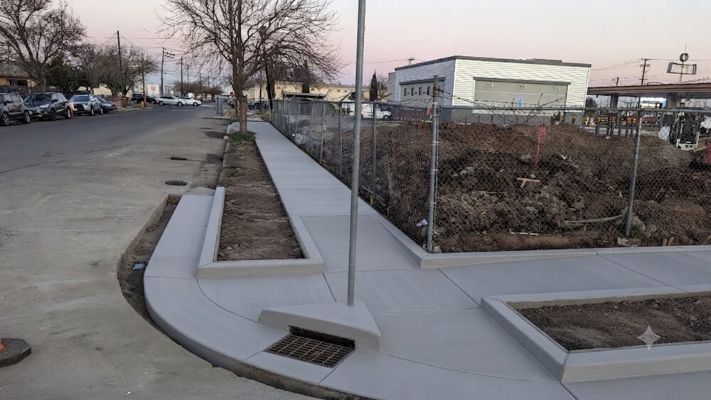 Commercial curb, gutter and sidewalk at a street corner