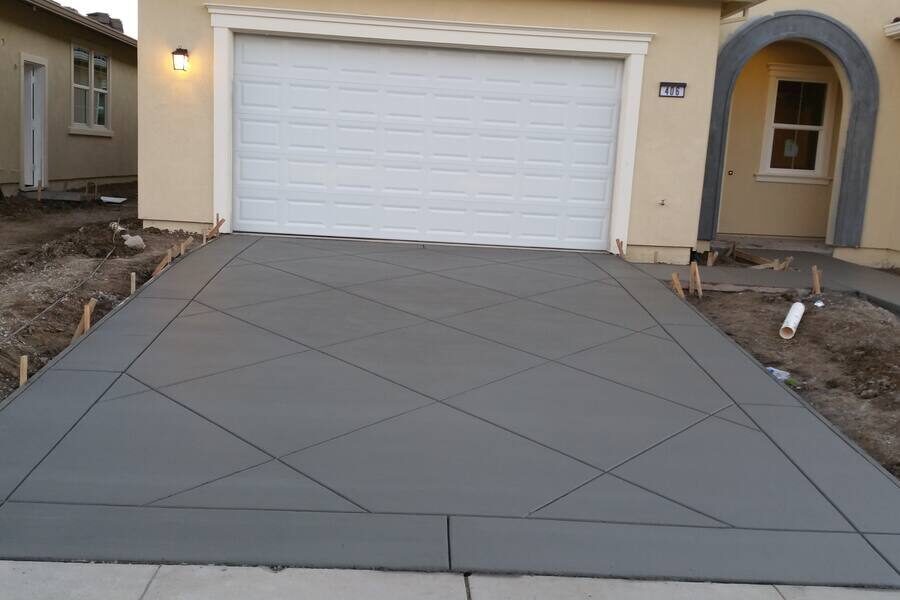 Diamond pattern scored concrete driveway