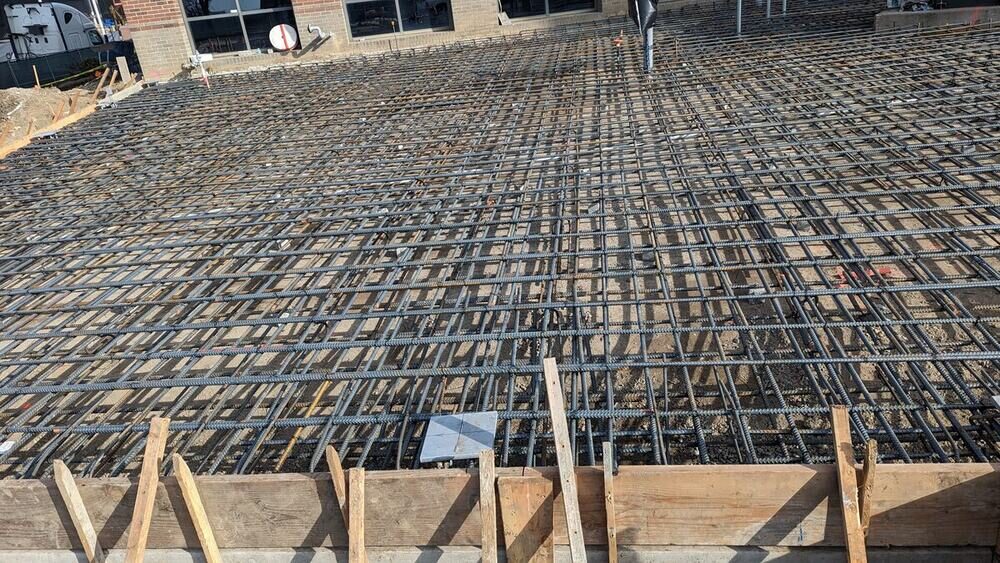 Rebar grid prepared for a structural concrete foundation slab